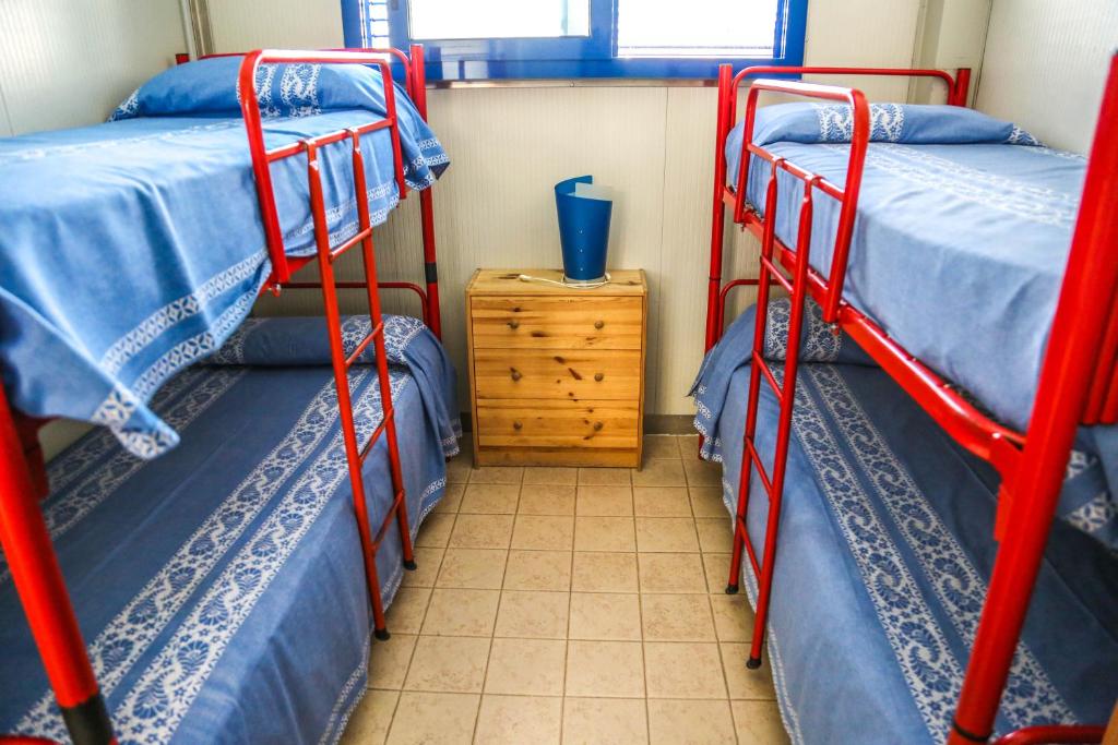 Postel nebo postele na pokoji v ubytování Camping Liana