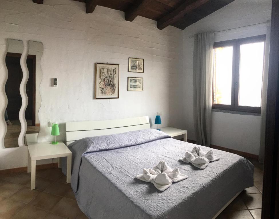 L'Emozione a Porto Pino - Lussuosa Villa Fronte Mare