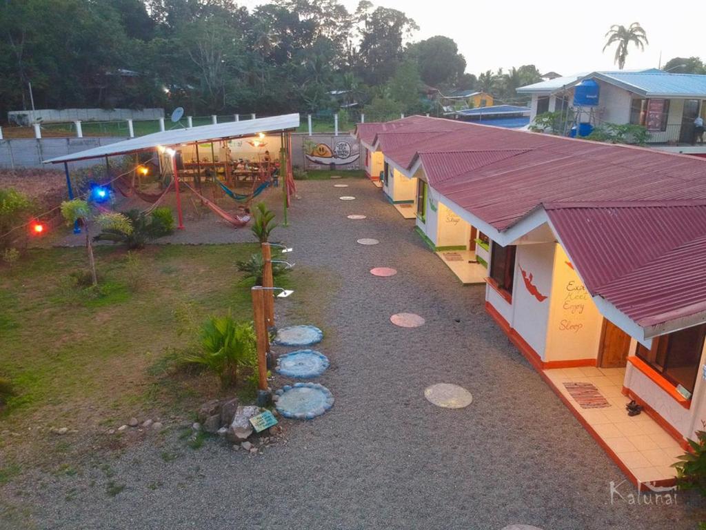 a small town with a lot of houses and trees at Kalunai Hostel in Puerto Viejo