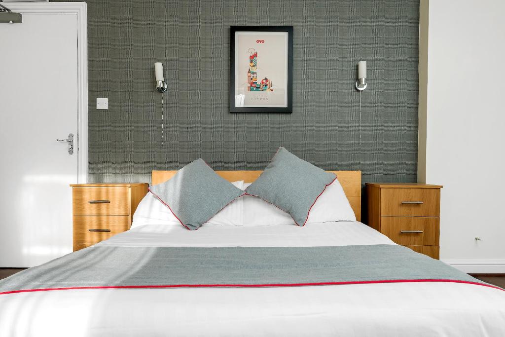 Postel nebo postele na pokoji v ubytování Flexistay Tulsi Aparthotel