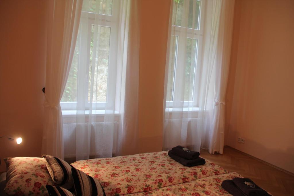 Postel nebo postele na pokoji v ubytování Jurincom apartments Sadová