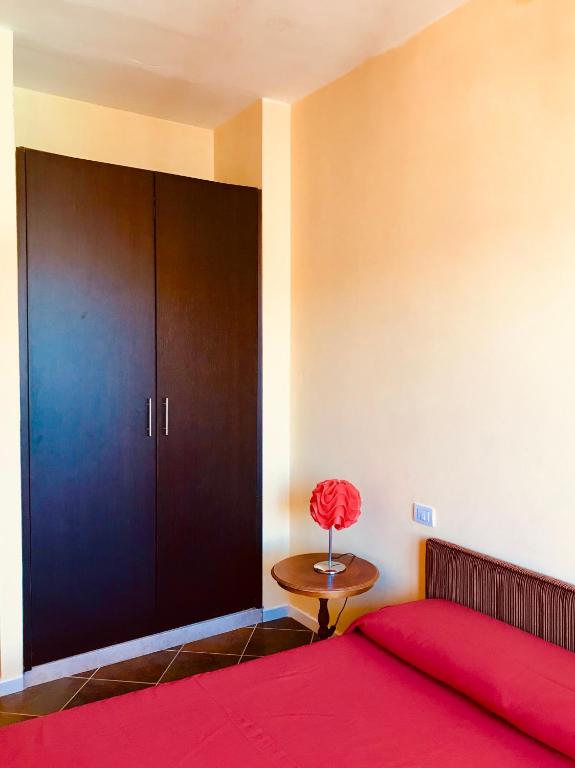 Postel nebo postele na pokoji v ubytování Rodi Garganico