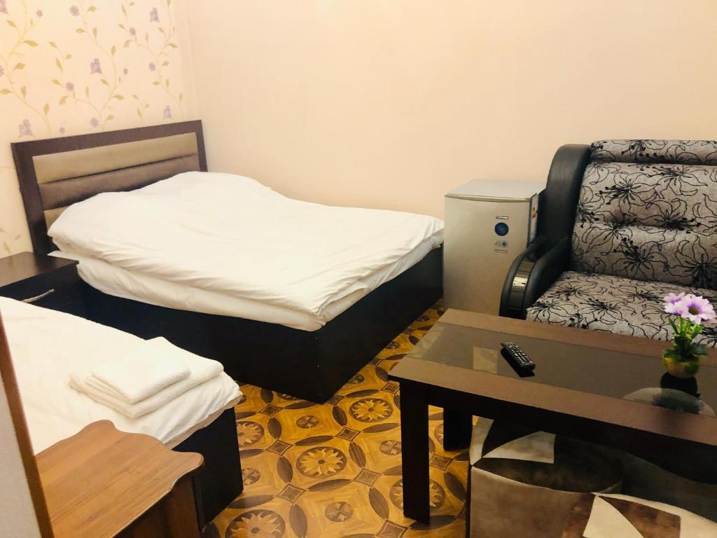 Postel nebo postele na pokoji v ubytování Har-Mar Hotel