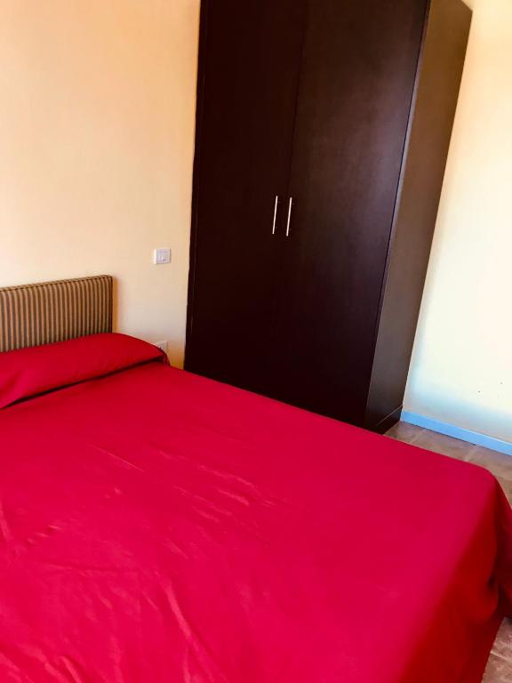 Postel nebo postele na pokoji v ubytování Rodi Garganico