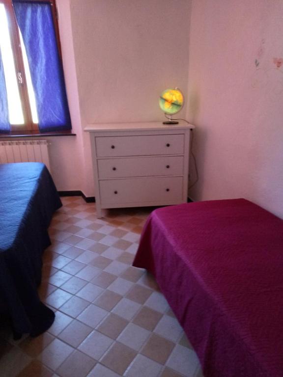 Postel nebo postele na pokoji v ubytování Appartamento in dimora tipica