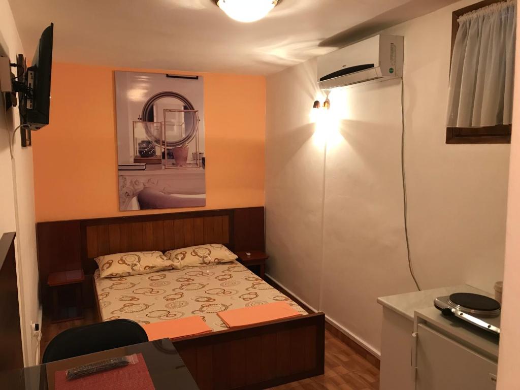 Postel nebo postele na pokoji v ubytování Apartments Jankovic