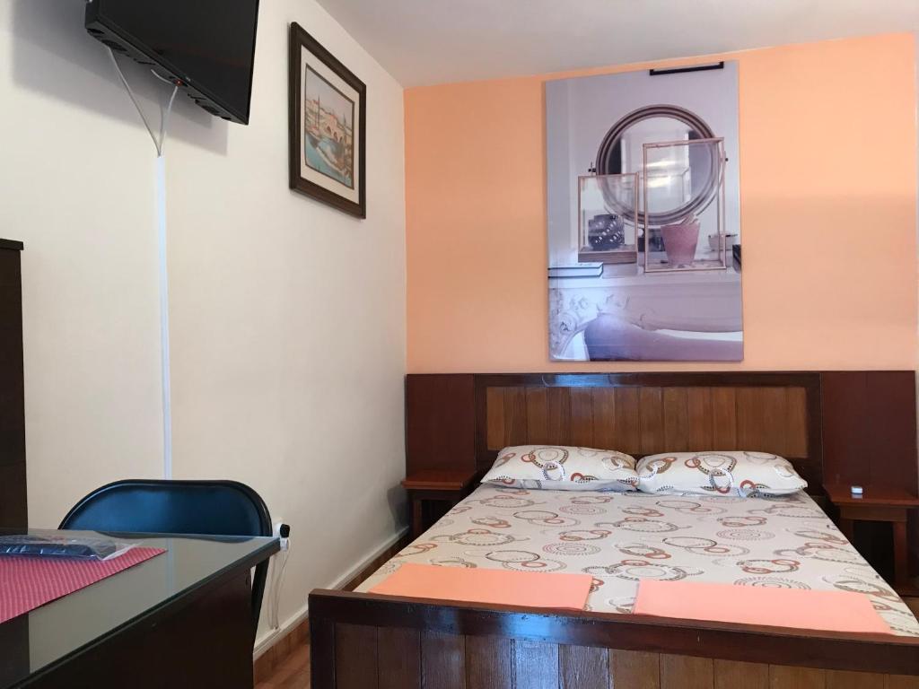 Postel nebo postele na pokoji v ubytování Apartments Jankovic