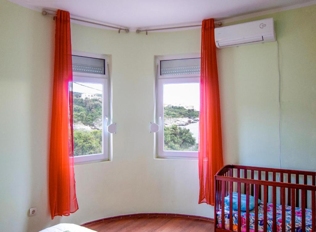Postel nebo postele na pokoji v ubytování Villa Rossa