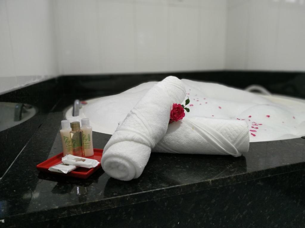 Postel nebo postele na pokoji v ubytování Refúgio das Rosas