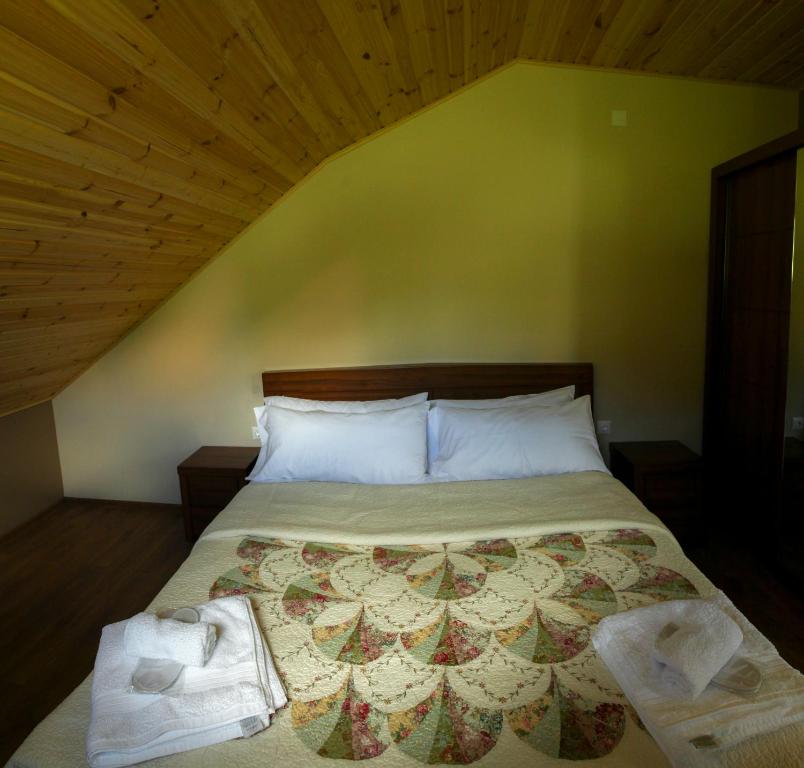 Postel nebo postele na pokoji v ubytování Hotel Patriot