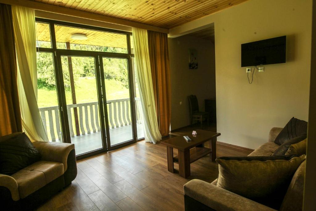 TV a/nebo společenská místnost v ubytování Hotel Patriot