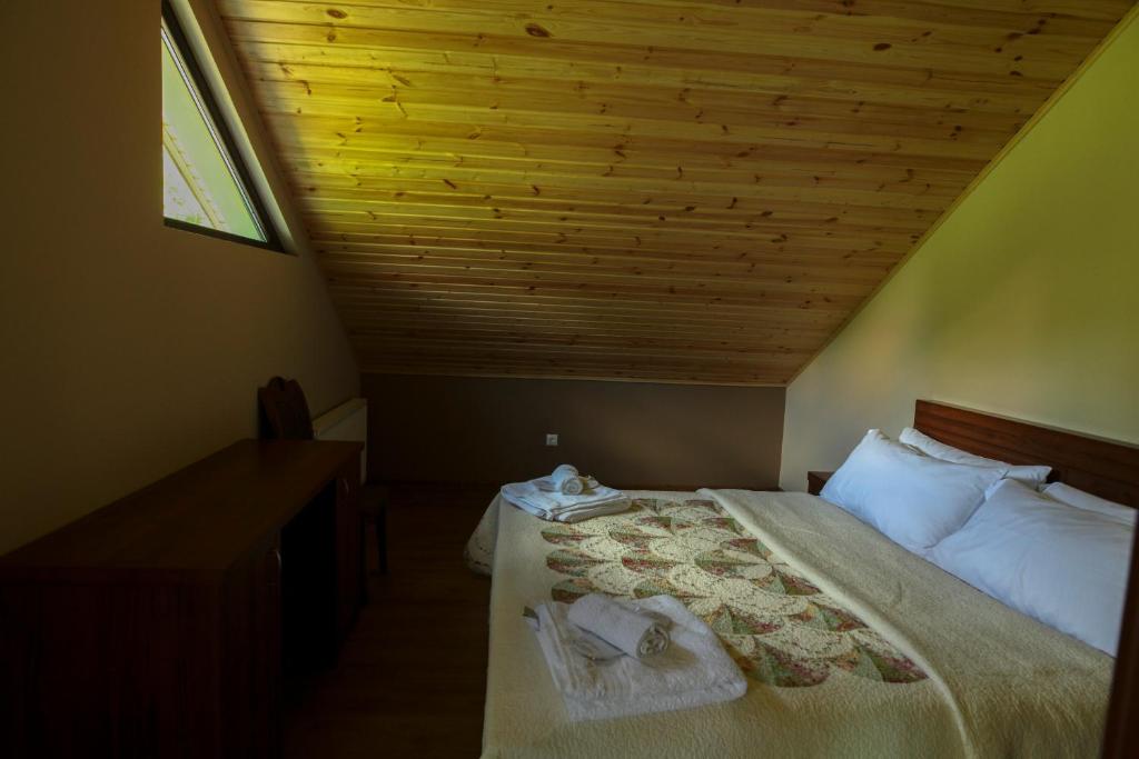 Postel nebo postele na pokoji v ubytování Hotel Patriot
