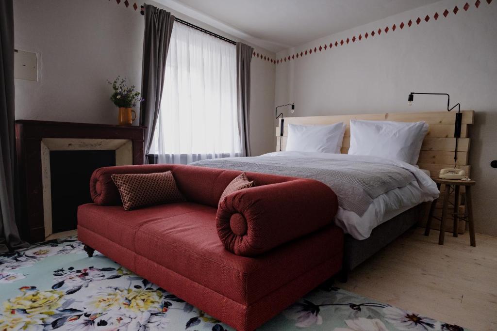 Postel nebo postele na pokoji v ubytování Monastery Garden Bistro & Rooms
