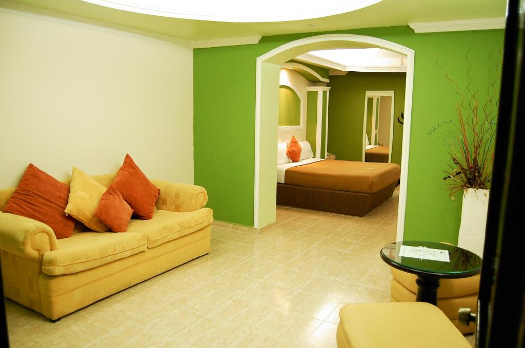 Postel nebo postele na pokoji v ubytování Hotel Porto Novo