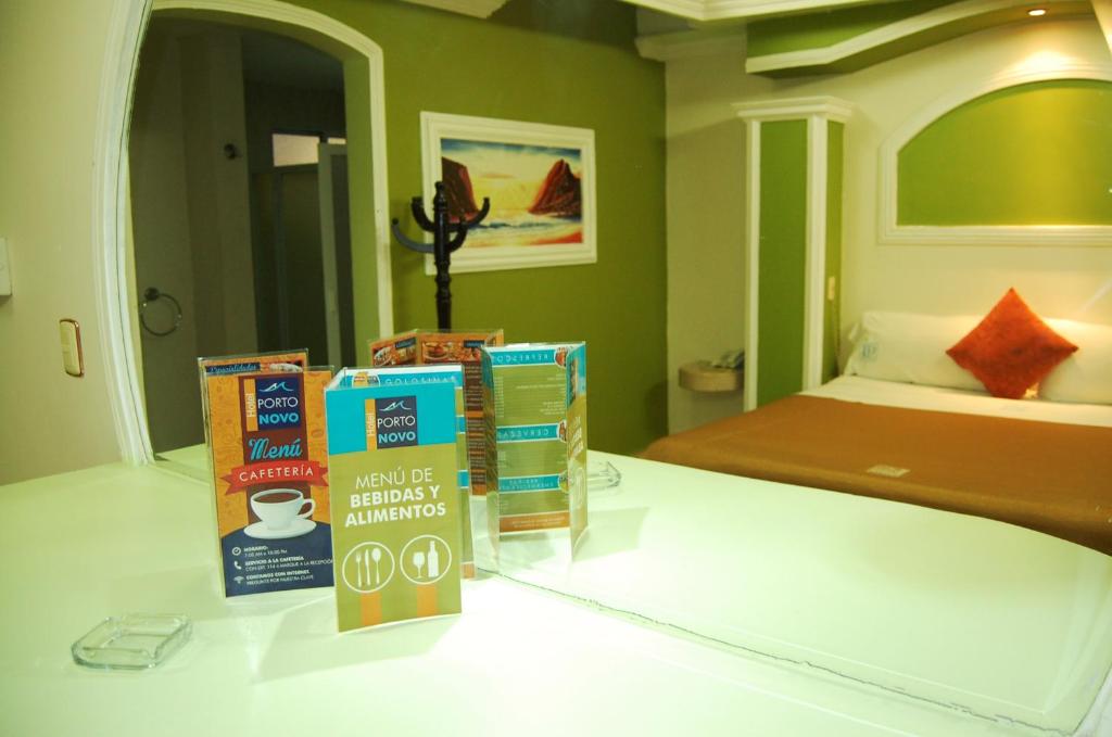 Postel nebo postele na pokoji v ubytování Hotel Porto Novo