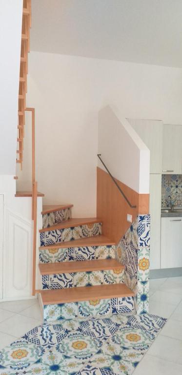 A bed or beds in a room at La finestra sul cortile