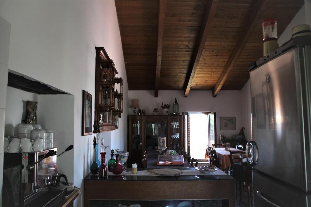 A kitchen or kitchenette at Casa del Geco