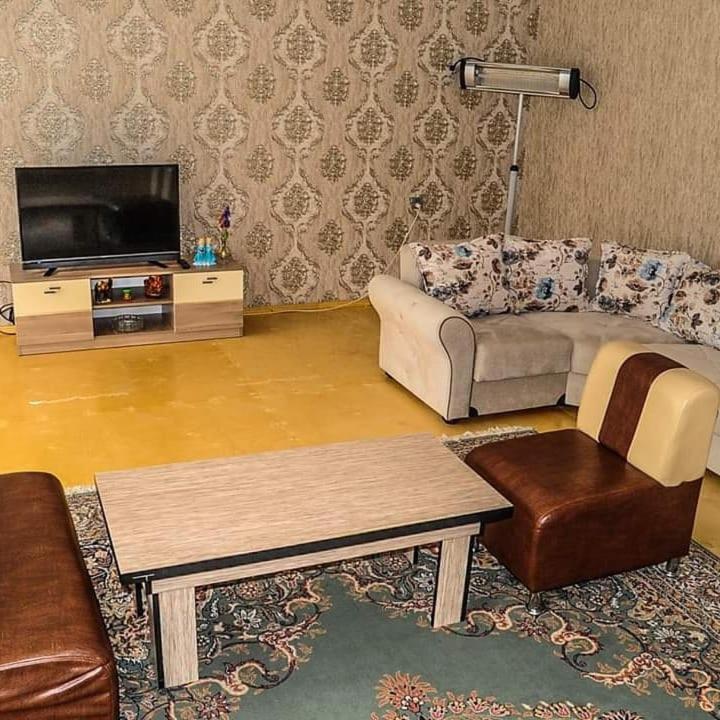 TV a/nebo společenská místnost v ubytování ElVin