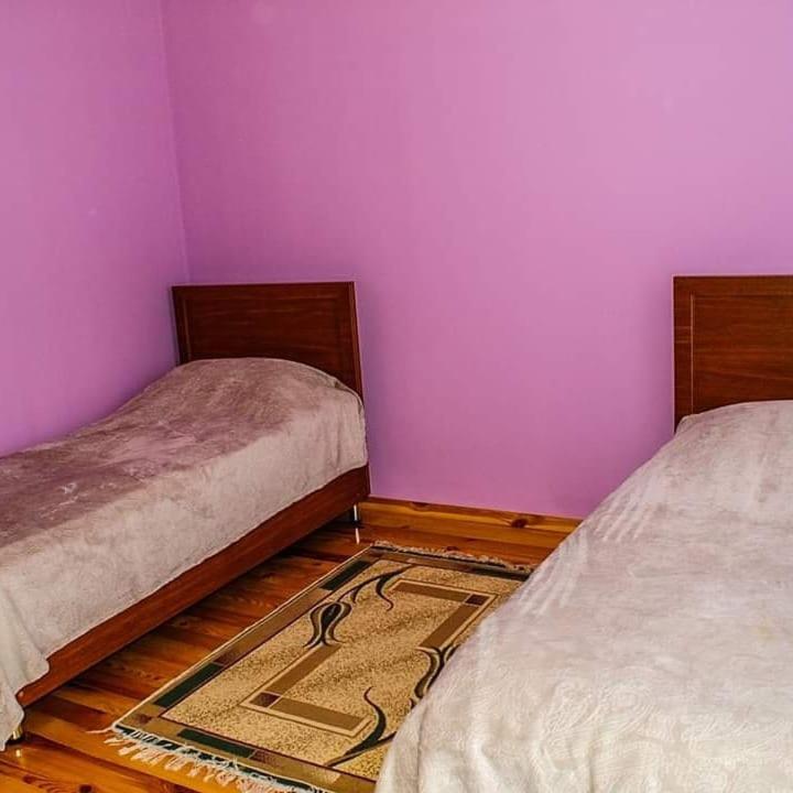 Postel nebo postele na pokoji v ubytování ElVin
