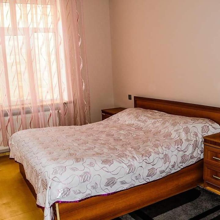 Postel nebo postele na pokoji v ubytování ElVin