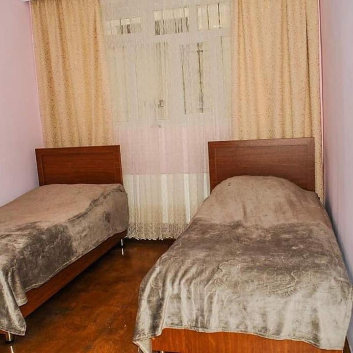 Postel nebo postele na pokoji v ubytování ElVin