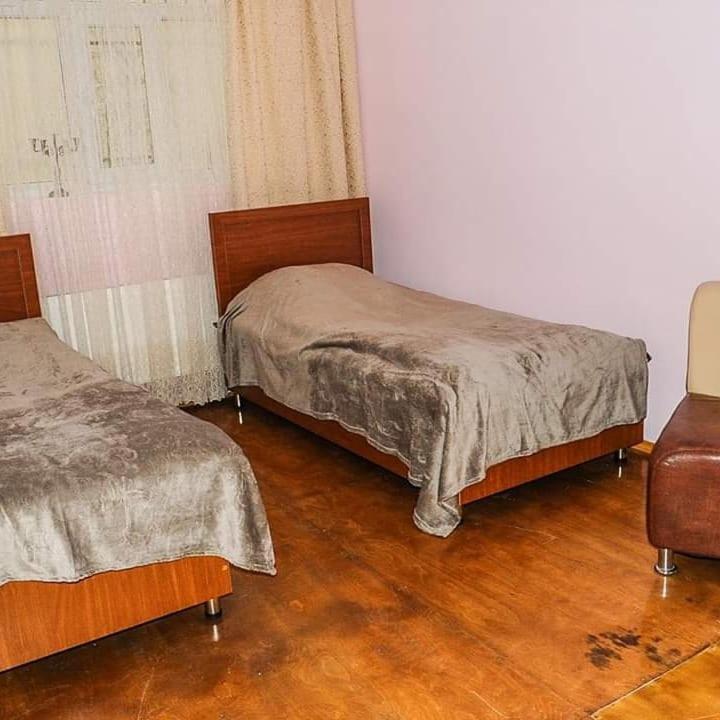 Postel nebo postele na pokoji v ubytování ElVin