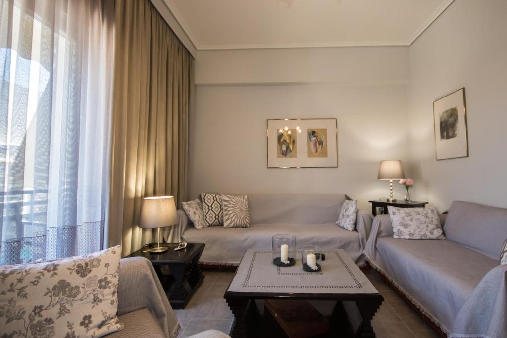 Posezení v ubytování Lia's Center Apartment