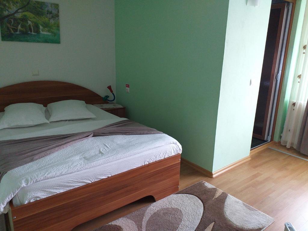 Postel nebo postele na pokoji v ubytování Casa Raluca
