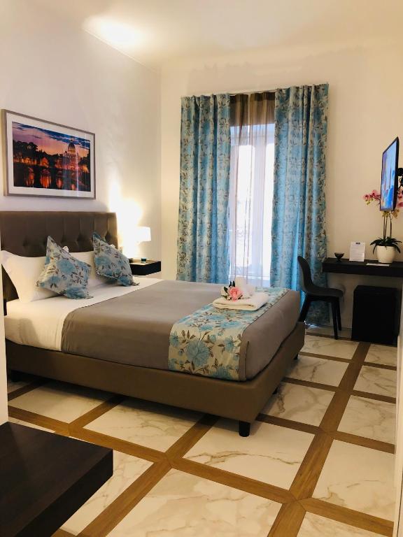 Posteľ alebo postele v izbe v ubytovaní KAMBAL LUXURY SUITES