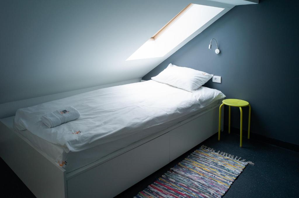 Postel nebo postele na pokoji v ubytování Good People Design Hostel