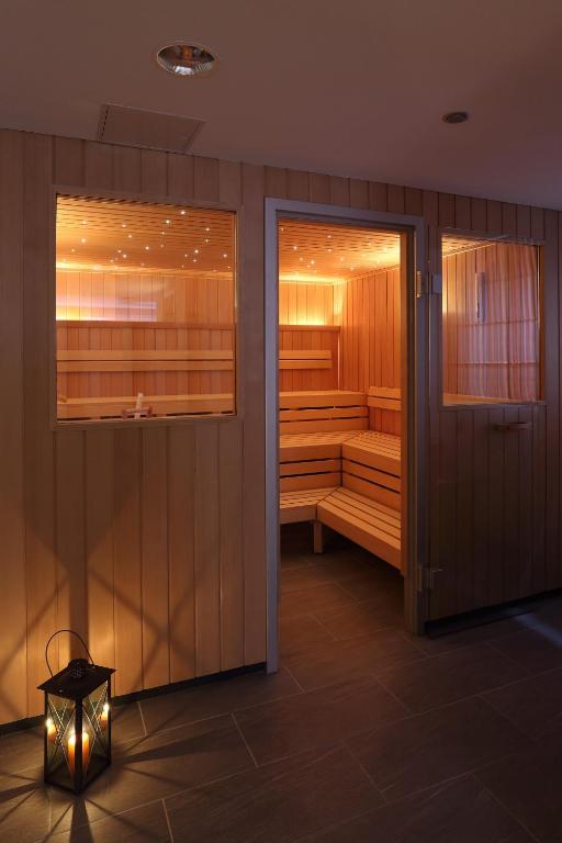 Postel nebo postele na pokoji v ubytování Hotel Landhaus Feldmeier ***S