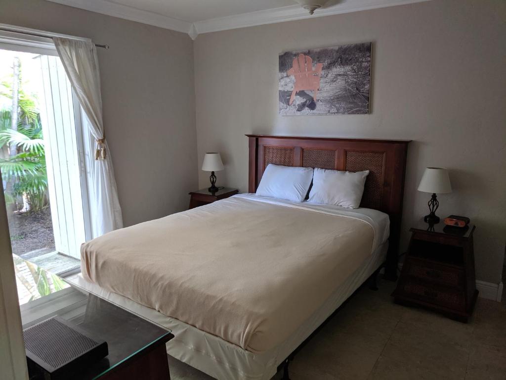 Postel nebo postele na pokoji v ubytování Manhattan Tower Apartment Hotel