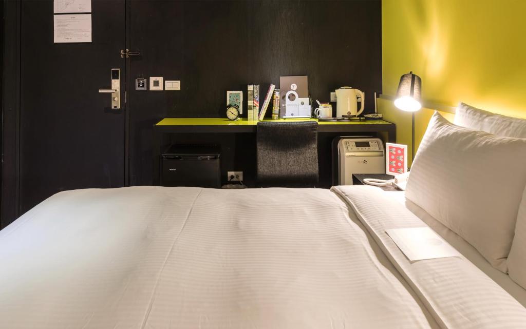 Postel nebo postele na pokoji v ubytování Vendome East Inn