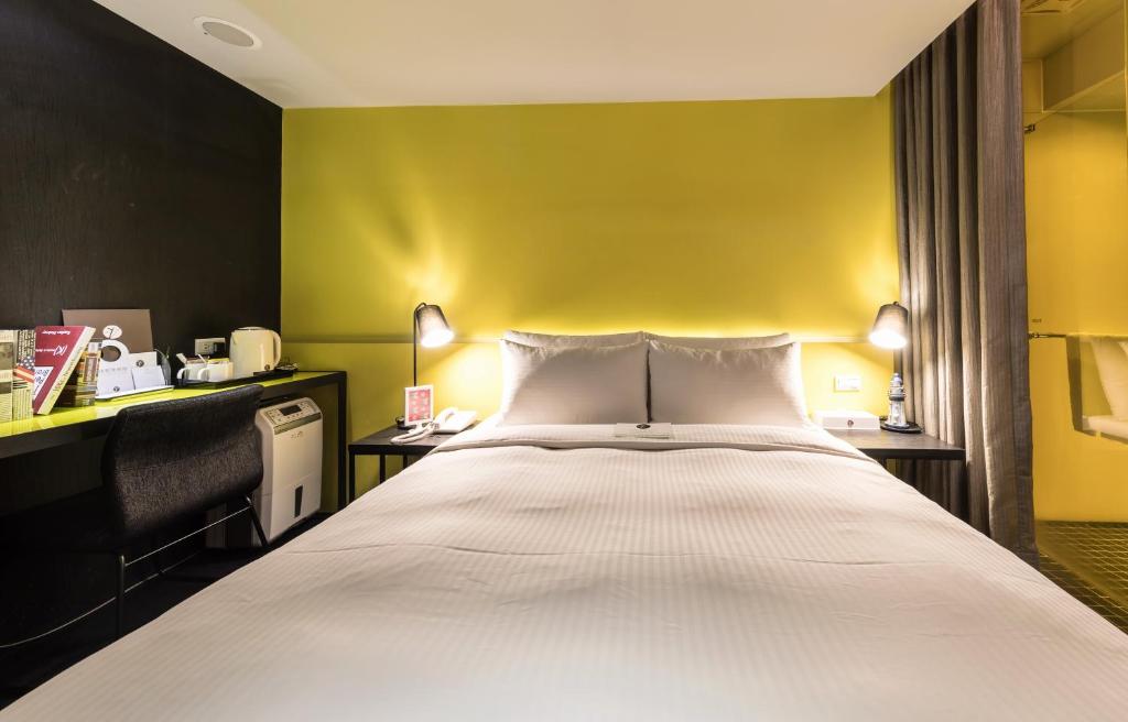 Postel nebo postele na pokoji v ubytování Vendome East Inn