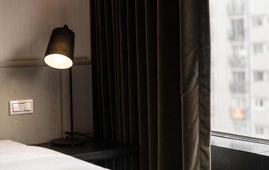 Postel nebo postele na pokoji v ubytování Vendome East Inn