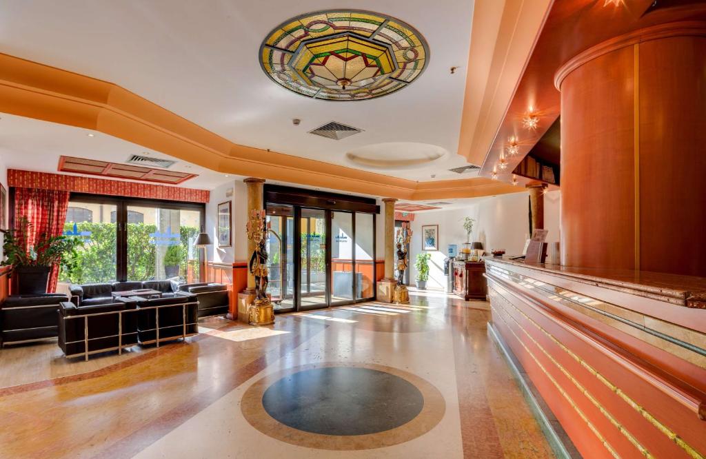 Lobbyn eller receptionsområdet på Best Western Hotel Tritone