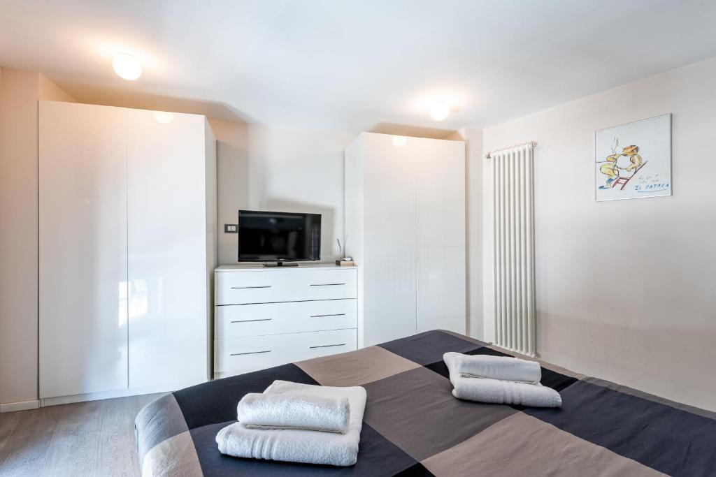 Posteľ alebo postele v izbe v ubytovaní IREX Tevere Sant Angelo private apartment