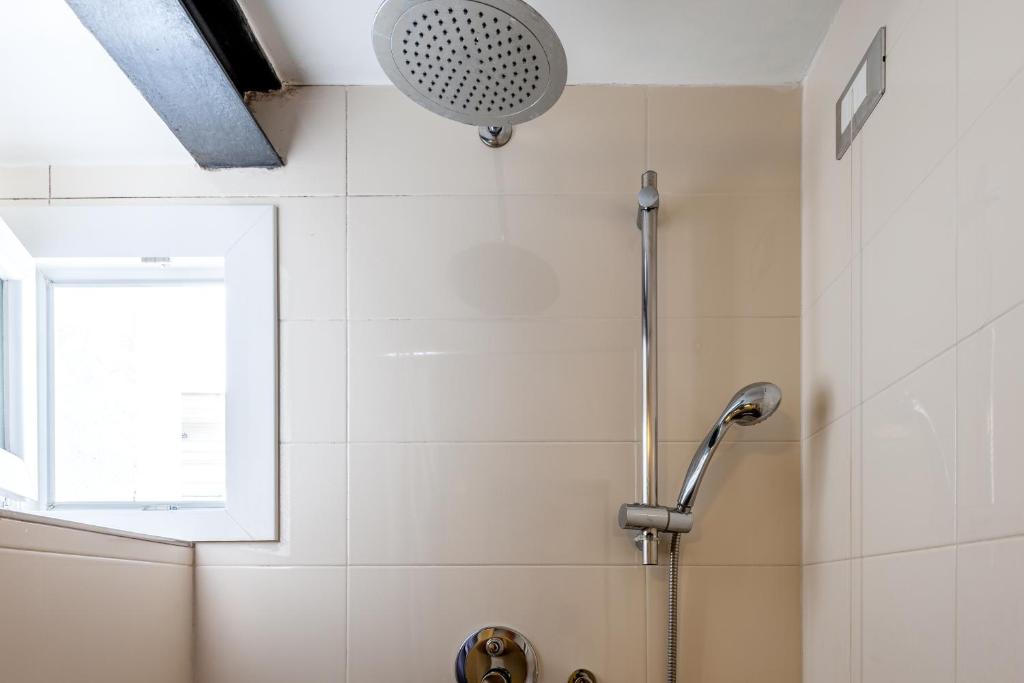Kúpeľňa v ubytovaní IREX Tevere Sant Angelo private apartment