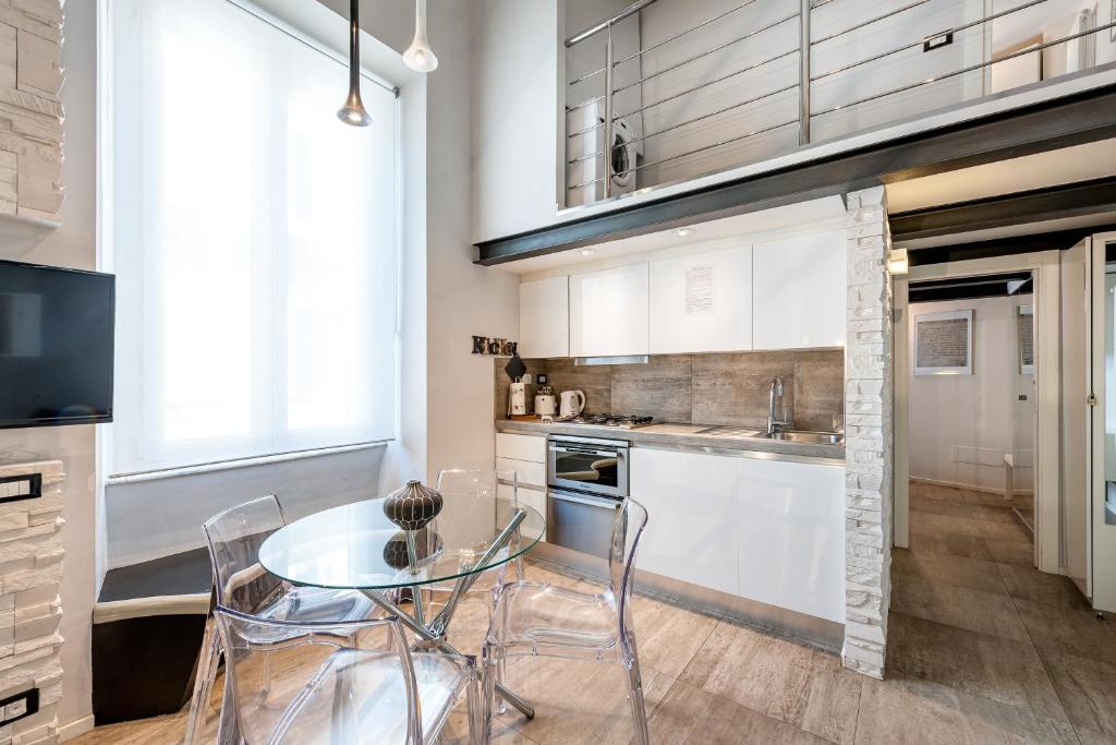 Kuchyňa alebo kuchynka v ubytovaní IREX Tevere Sant Angelo private apartment