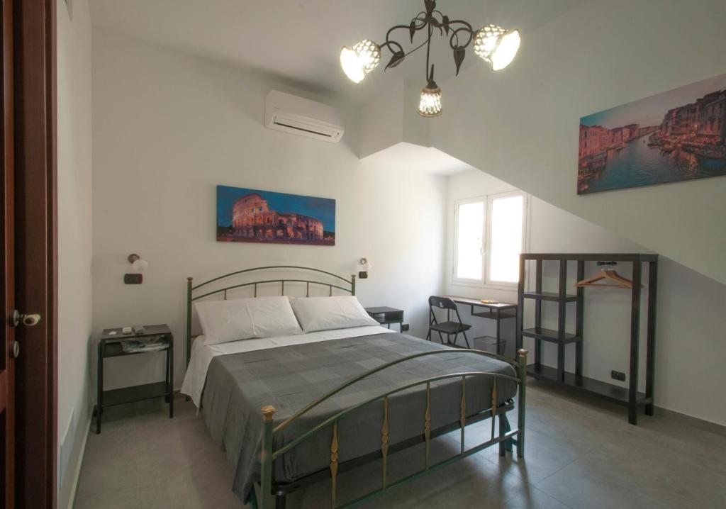 Postel nebo postele na pokoji v ubytování B&b Vittoria House