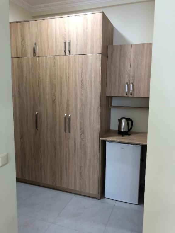 Kuchyň nebo kuchyňský kout v ubytování Hotel Belugo