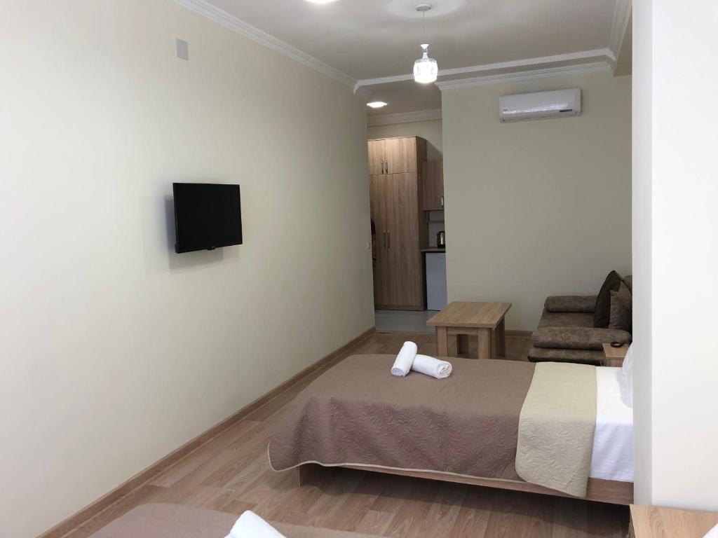 TV a/nebo společenská místnost v ubytování Hotel Belugo