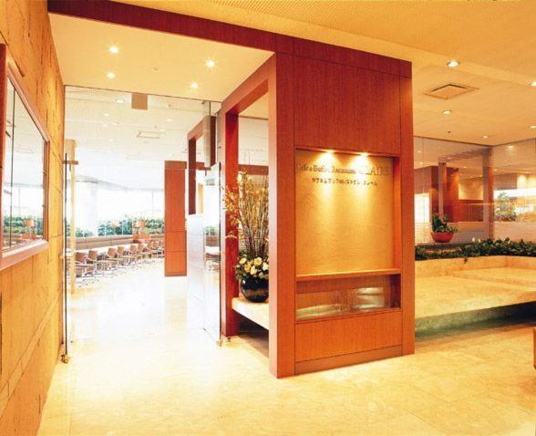 Postel nebo postele na pokoji v ubytování Fukuyama New Castle Hotel