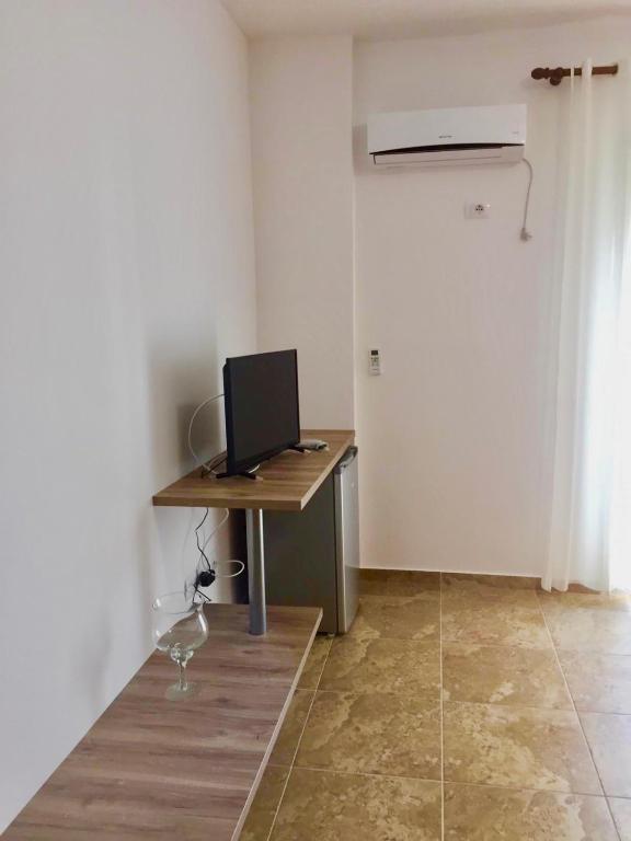 TV a/nebo společenská místnost v ubytování Camere vista mare