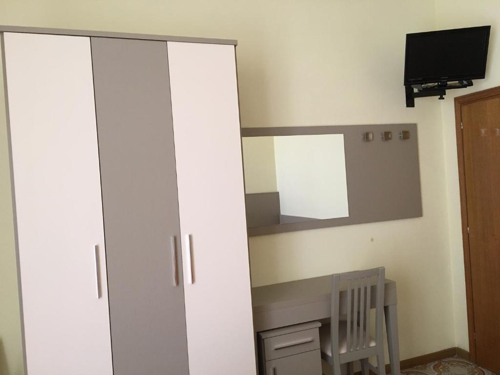 TV a/nebo společenská místnost v ubytování Hotel Laila