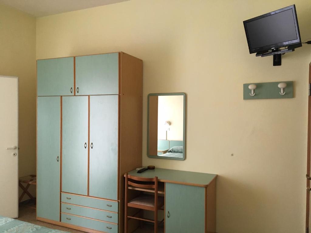 TV a/nebo společenská místnost v ubytování Hotel Laila
