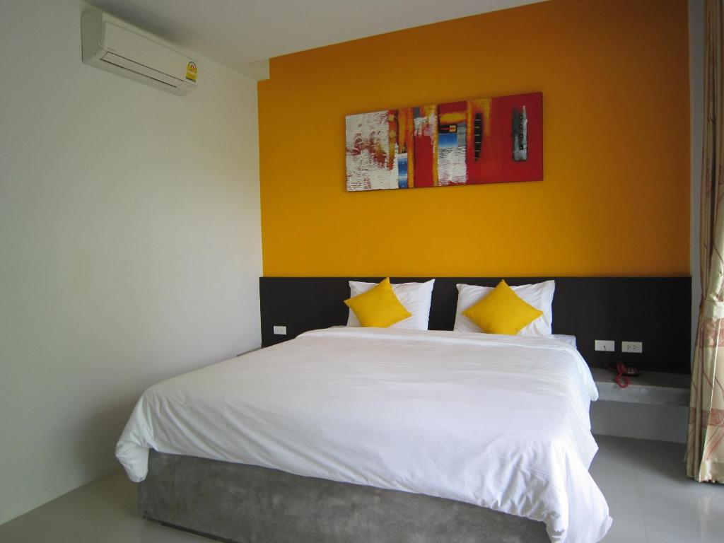 Postel nebo postele na pokoji v ubytování The Fong Krabi resort