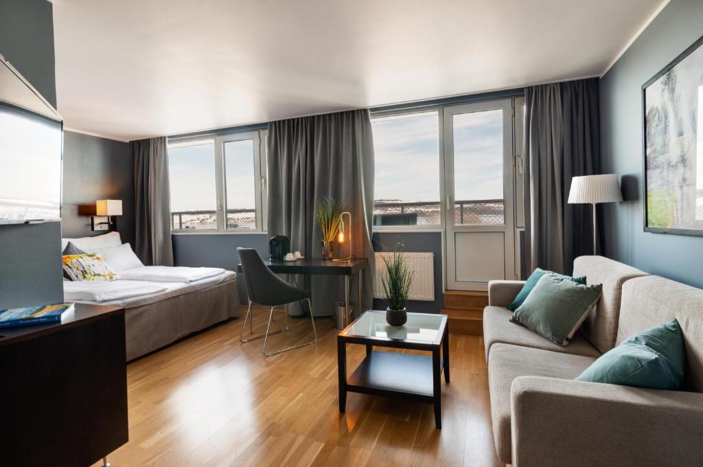 Postel nebo postele na pokoji v ubytování Quality Hotel Strand Gjøvik