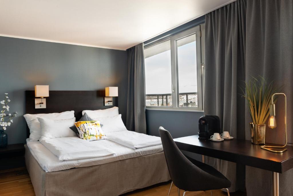 Postel nebo postele na pokoji v ubytování Quality Hotel Strand Gjøvik