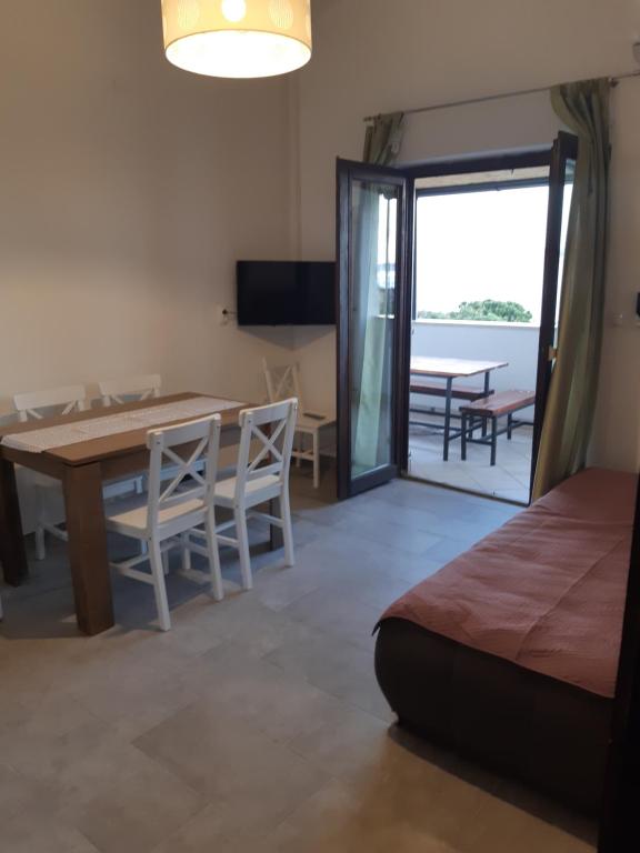 Telewizja i/lub zestaw kina domowego w obiekcie Apartments Vukelić
